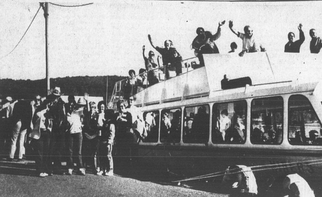 A group boards a Pictured Rocks Cruises boat in the 1980s. The Munising News.