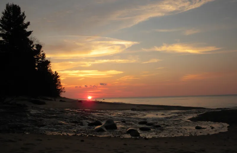 The sun setting at Hurricane River Campground