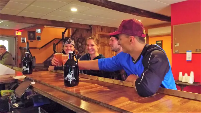 A group of friends enjoying a beverage at East Channel Brewing Company
