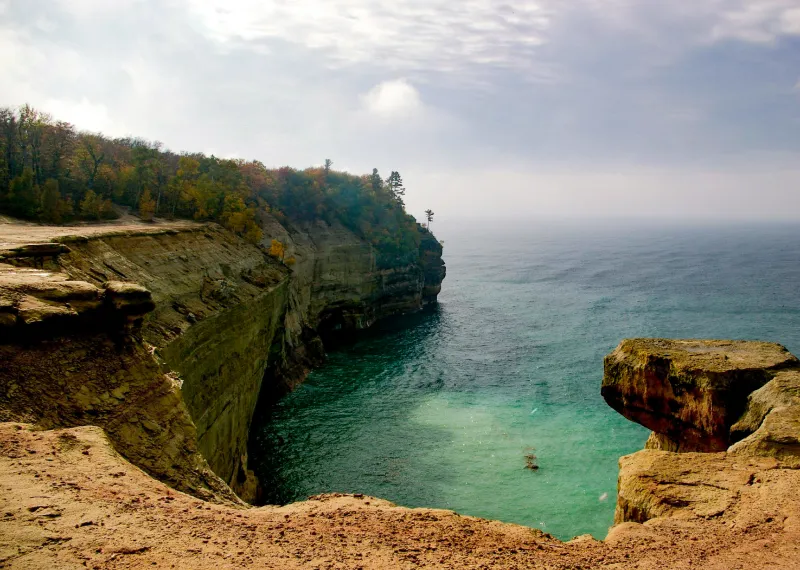 The view from Grand Portal after a hike, with Pictured Rocks Cliffs and Lake Superior waters